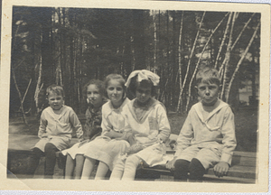 Rosenburg boys and girls sit on ledge