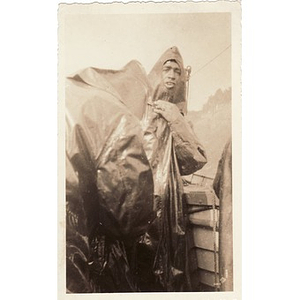 Reverend Laymon Hunter wears a rain poncho during a visit to the Niagra Falls