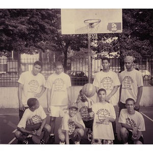Group portrait of the Boston Police District 4 Basketball League.