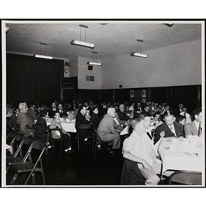 Guests seated at tables in an auditorium at a Boys' Clubs of Boston Awards Night