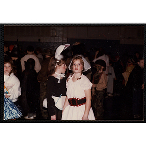 A girl in a Halloween costume pauses for the camera