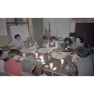 Guests talking during a Chinese Progressive Association anniversary event