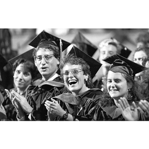 Graduates applaud at the Law School commencement ceremony