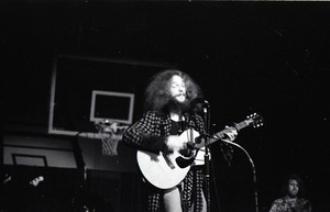 Jethro Tull in concert at the Springfield Civic Center: Ian Anderson playing acoustic guitar