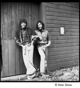 Peter Simon (left) and Elliot Blinder, by a barn door, Tree Frog Farm Commune