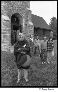 Ram Dass chanting outside the Reverend Preserved Smith Memorial Chapel, as attendees file out wearing blankets, Rowe Center spiritual retreat