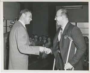 Dr. Knocke handing prize to Adrian Gusowski at Institute Day