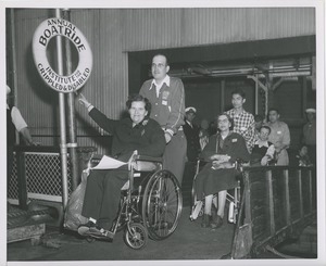 Wheelchair users coming up gangplank