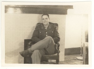 Joseph Langland: portrait in uniform, seated