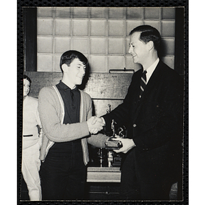 "Overseer, Walter Robb, III, Presents Trophies And Individual Awards" at a Boys' Club basketball tournament