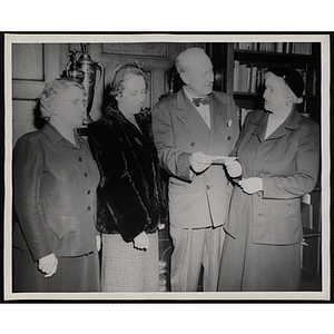 Executive Director of Boys' Club of Boston Arthur T. Burger (third from left) poses with three member of the Mothers' Club