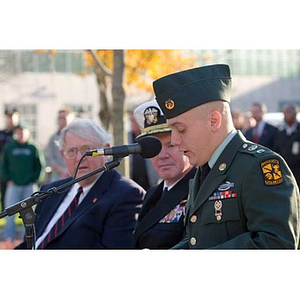 A man in military dress speaks at the Veterans Memorial dedication