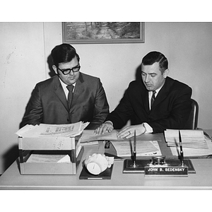 A Business Administration student sits with his co-op employer