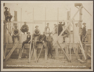 Workmen pose for a picture at the NYNH & H (New York, New Haven, & Hartford) signal tower at Buzzard's Bay