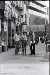 Free Spirit Press crew distributing their magazine on the street