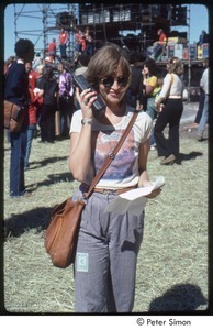 MUSE concert and rally: MUSE staff member using walkie talkie