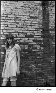 Karen Helberg, posed by a brick wall in York, Pa.