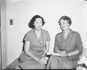 Helen Curtis sitting indoors with Mrs. Isabelle C. Gonor, new Assistant Dean of Women