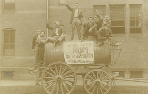 Class of 1909 members on a barrel wagon