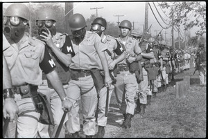 Antiwar demonstration at Fort Dix, N.J.: line of military police advancing, truncheons drawn