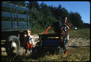 Becky and Fred Cann with Western picker and bog truck, Duxbury Cranberry Company