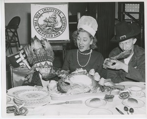 Connie Boswell eating turkey with two clients in costume