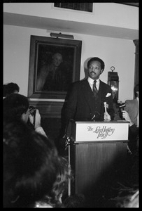 Jesse Jackson at the podium, addressing supporters