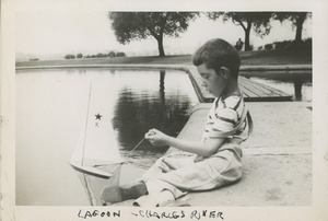 Joel Kahn with toy boat at Charles River Lagoon