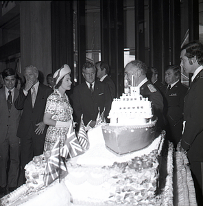 [Queen Elizabeth II speaking with a group of men at Boston City Hall]