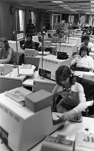 Unidentified call center workers at Boston Police Dispatch Operations