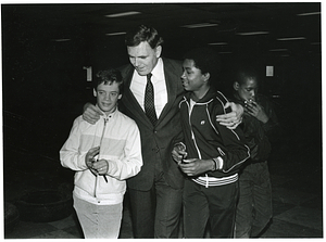 Mayor Raymond L. Flynn with three unidentified boys