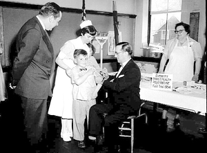 Dr. Frank Mirabello administers the new polio vaccine