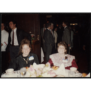 Julie Treanor, on the right, seated with an unidentified girl at the "Recognition Dinner at Harvard Club"