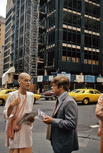 Hare Krishna monk with a businessman