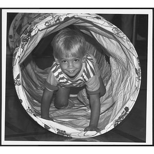 Child crawling at West Roxbury branch