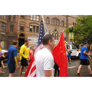Boston City Councillor Mike Ross Carrying an American Flag in Copley Square after #OneRun