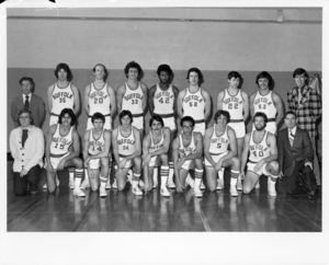 Suffolk University men's basketball 1975-1976 team photograph; Chris Tsiotos (#33) is back row, standing, fourth from left, 1976