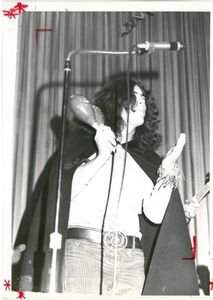 Suffolk University student performing at an unidentified event, 1970s