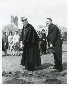 Carney Hall exterior: groundbreaking with Richard Cushing and Michael P. Walsh, Helen FitzGerald, Chris Flynn, and Gasson Hall in background