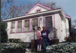 Purple Passion painters standing in front of their handiwork