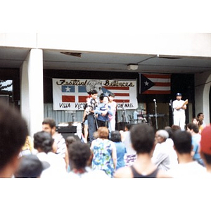 Performers at a rainy Festival Betances.