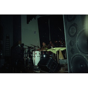 Musicians performing on stage at the Jorge Hernandez Cultural Center.