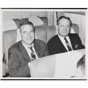 William J. Lynch, at right, seated with an unidentified man