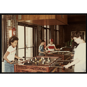 Children playing foosball games