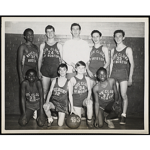 The Boys' Clubs of Boston basketball team pose for a group shot