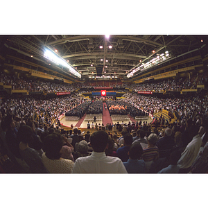 Aerial view of guests and graduates seated at commencement