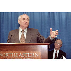 Mikhail Gorbachev speaking at a podium
