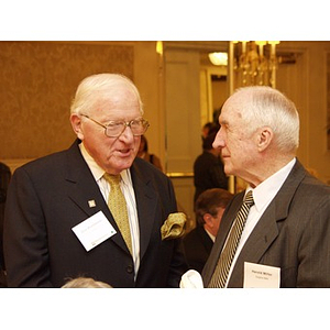 Two men talking during the College of Business Administration's CEO Breakfast