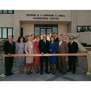 Snell family and President Ryder at a ribbon cutting ceremony