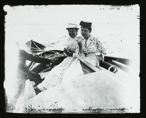 Elinor Curtis and Bessie P. eating on a boat, Manchester, Mass., undated